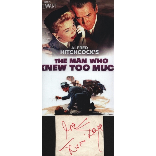 43 - Doris Day cut signature page with accompanying promo photo.