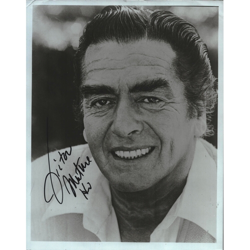 53 - Victor Mature signed 10x8inch black and white photo.