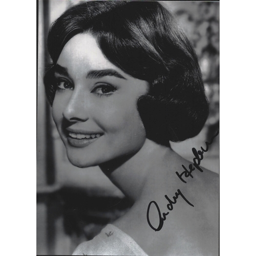 59 - Audrey Hepburn signed 7x5inch black and white photo.