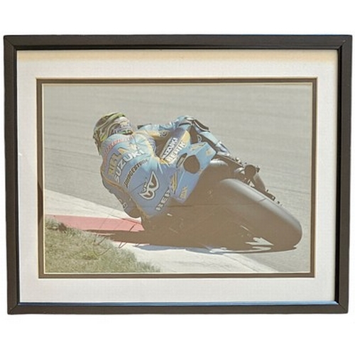 69 - Chris Vermeulen 16x12 inch framed and mounted colour photo. Signed. Good condition Est.