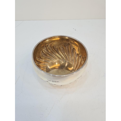 113 - A silver bowl having gilt interior and half gadrooned body. London 1892, makers mark indistinct. 5.0... 