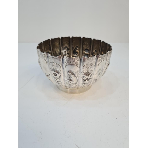 114 - A decorative Victorian silver bowl chased with flowers and animals, by Richard Sibley II, London 186... 