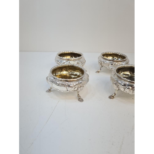 119 - A set of four silver Victorian salts by Daniel and Charles Houle. Gilted interior, floreated embosse... 