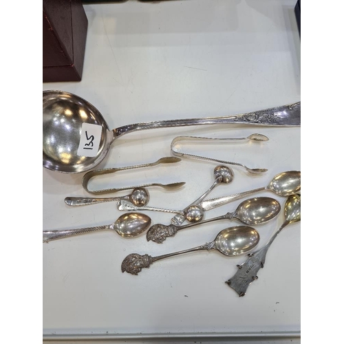 135 - A small selection of silver flatware to include Georgian mustard spoons. Also with plate, and a larg... 