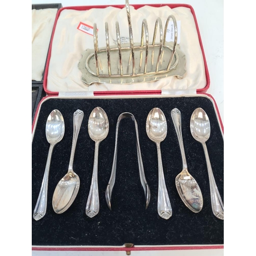 15 - Cased Continental silver teaspoons, spoons marked 800, having half gadrooned borders. Also with case... 