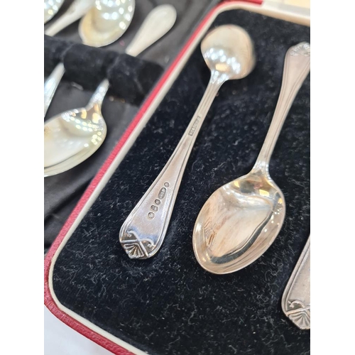 15 - Cased Continental silver teaspoons, spoons marked 800, having half gadrooned borders. Also with case... 