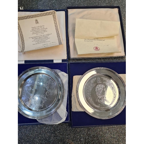 20 - A silver Queen Elizabeth II and Print Phillip plate, limited edition by William Comyns and Sons Ltd.... 