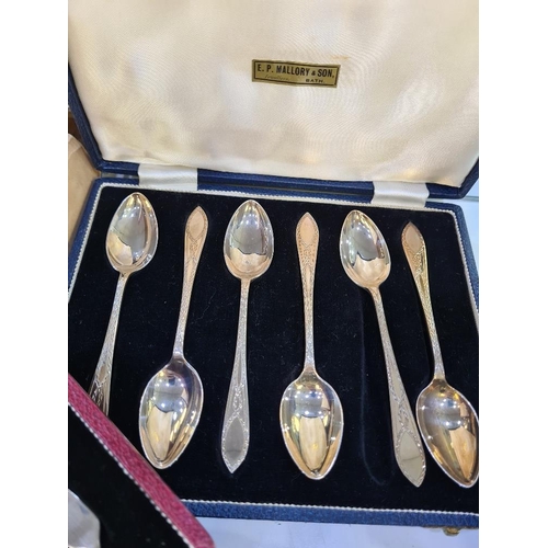 22 - Silver teaspoons for the silver Assay Offices, cased. Also with a cased set of decorative silver tea... 