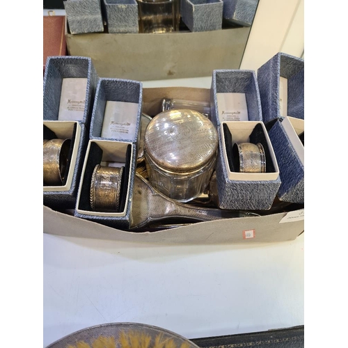 31 - A mixed silver lot comprising silver backed dressing table items. Also with silver boxed napkin ring... 