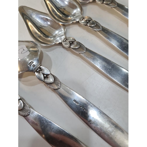 48 - Georg Jensen Ltd. Five quality Georg Jensen silver Danish spoons hallmarked with the London import m... 