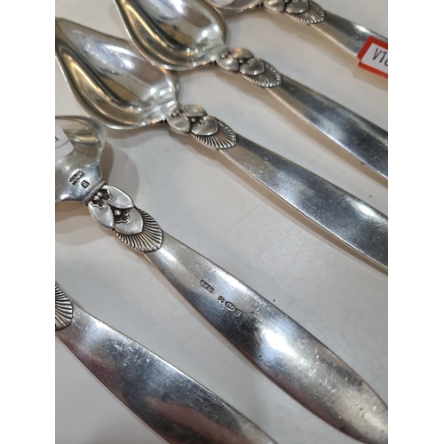 48 - Georg Jensen Ltd. Five quality Georg Jensen silver Danish spoons hallmarked with the London import m... 