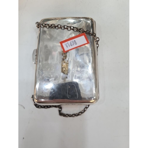 78 - A silver purse of vacant design with a chain. Chester 1913. Maker's mark worn. Condition report: No ... 