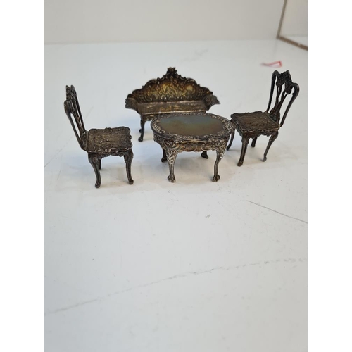 98 - A silver miniature table and chairs by David Hollander and Son, Birmingham 1981. Comprising a sofa s... 