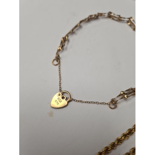 1012 - Fine 9ct gold neckchain, marked 375, 9ct gold 3 bar gate link with heart shaped clasp and 9ct yellow... 