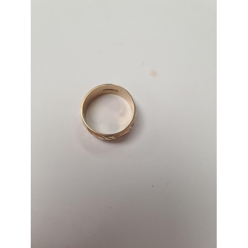 1014 - 9ct yellow gold wedding band with all over decoration, size V, 5.6g approx