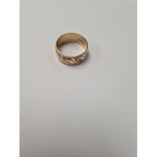 1014 - 9ct yellow gold wedding band with all over decoration, size V, 5.6g approx