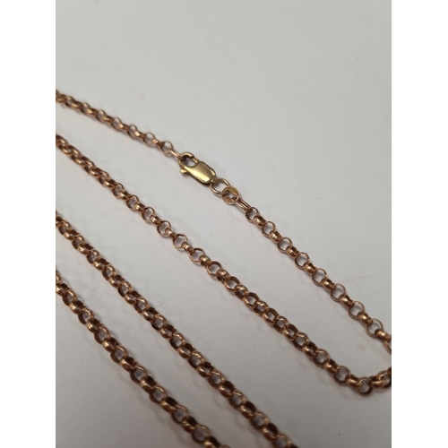 1016 - 9ct rose gold belcher chain, 62cm, marked 375, hung with a 9ct yellow gold rectangular St Christophe... 