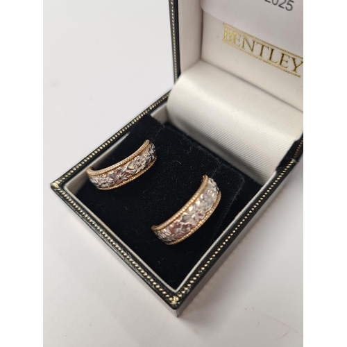 1026 - Pair 9ct two tone hoop earrings with beaded edges and white gold floral panel, marked 375, 4.4g appr... 