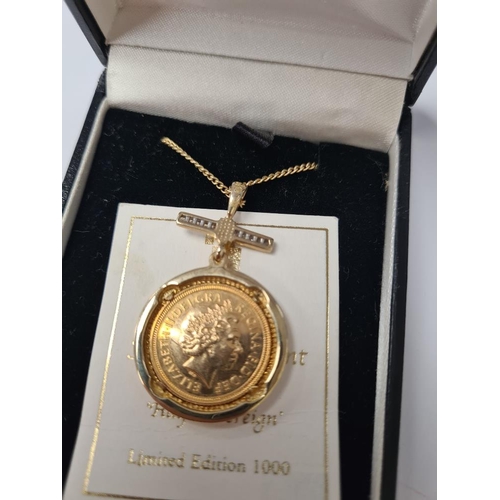 1031 - 9ct fine gold neckchain hung with a 2002 Half Sovereign Queen Elizabeth II and shield back in circul... 