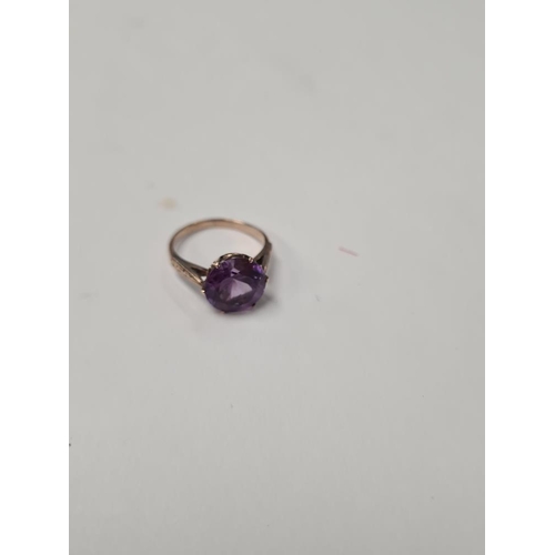 1035 - unmarked rose gold cocktail ring with large round mixed cut amethyst, size I, approx 2.2g