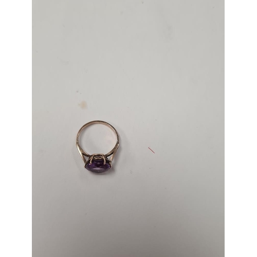 1035 - unmarked rose gold cocktail ring with large round mixed cut amethyst, size I, approx 2.2g