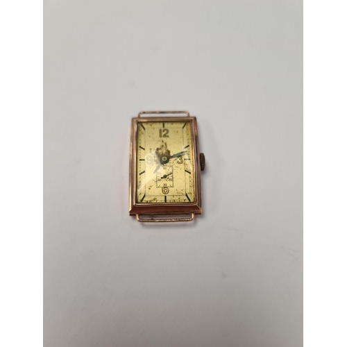 1058 - 9ct rose gold watch head, rectangular curved form, marked 375, inscribed to verso 'From Mum & Dad 19... 