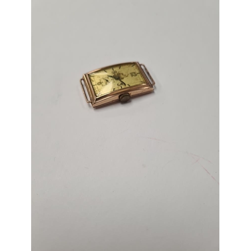 1058 - 9ct rose gold watch head, rectangular curved form, marked 375, inscribed to verso 'From Mum & Dad 19... 