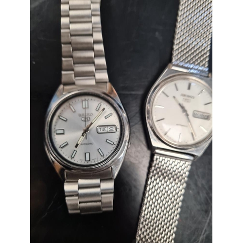 1080 - Stainless Steel day date automatic wristwatch, 539964, another Seiko day/date with open back reveali... 