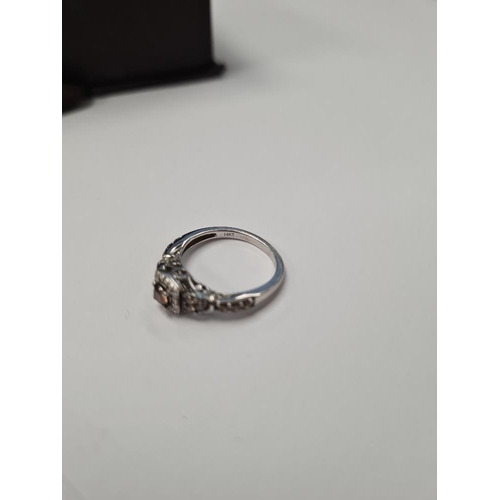 1089 - Contemporary 14K white gold diamond dress ring with central chocolate diamond with white diamond hal... 