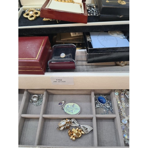 1102 - Jewellery box containing plated bangles, coins, opal brooch etc 