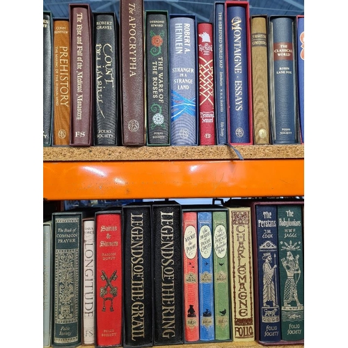 1152 - A quantity of Good folio society books, many unused titles such as 'The Holkham Bible' and 'The Qu'r... 