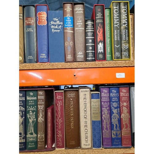 1152 - A quantity of Good folio society books, many unused titles such as 'The Holkham Bible' and 'The Qu'r... 