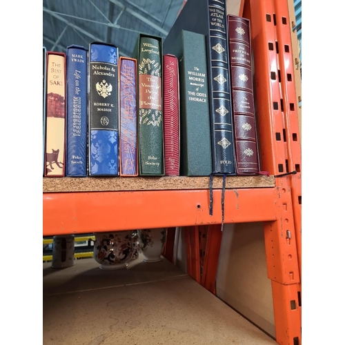 1152 - A quantity of Good folio society books, many unused titles such as 'The Holkham Bible' and 'The Qu'r... 