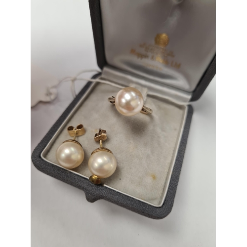 1070 - 9ct yellow gold dress ring with large simulated pearl, marked 375, maker WG Ltd and a similar pair y... 