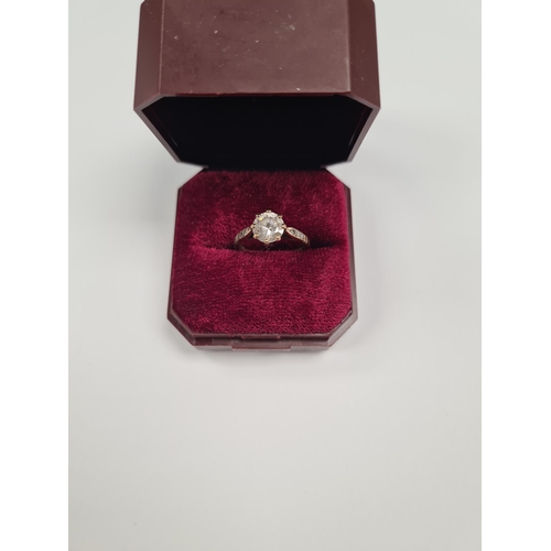 1042 - 9ct yellow gold dress ring with claw mounted round cut clear stone marked 375, size M, approx 2.4g