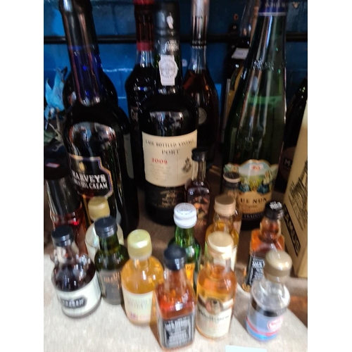 163 - Various alcohol and miniatures to include Cognac, Port, Sherry, etc