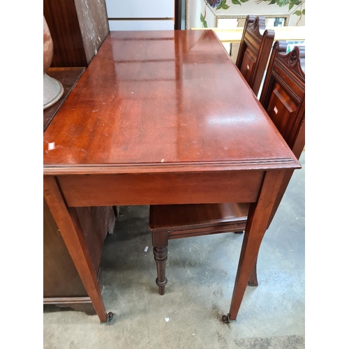 42 - Pair of late Victorian carved Walnut hall chairs and a 2 drawer side table