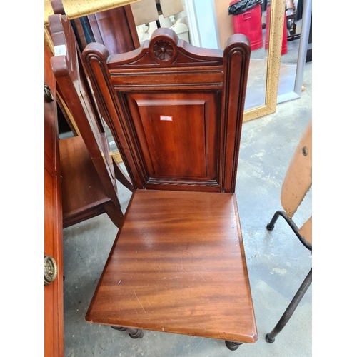 42 - Pair of late Victorian carved Walnut hall chairs and a 2 drawer side table