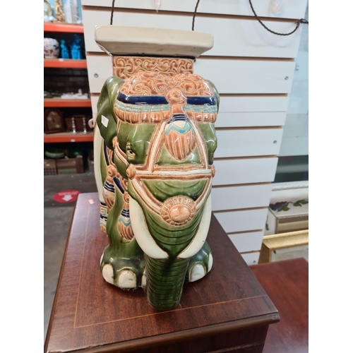 44 - Glazed pottery elephant plant stand