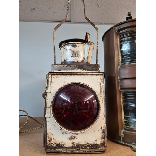 47 - Old copper double bulkhead lamp by Nippon Gento Company Ltd. and white painted British Rail lamp