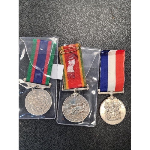 518 - A World War II Canada Voluntary Service medal and two World War II Africa medals, the Africa Service... 