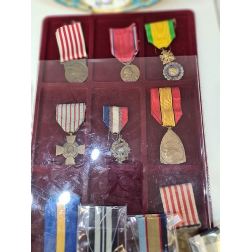 519 - A collection of World War 1 & II medals and others including Belgium, Australia and India examples