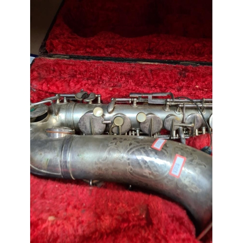 63 - C H Huller Saxophone silver plated in fitted case