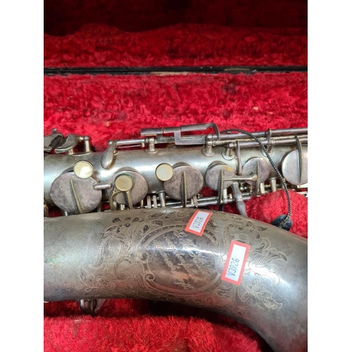 63 - C H Huller Saxophone silver plated in fitted case