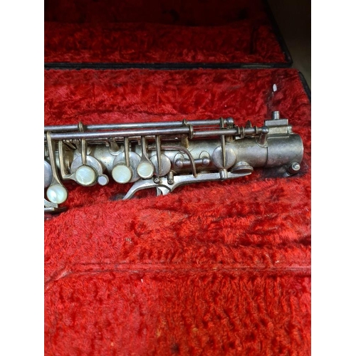 63 - C H Huller Saxophone silver plated in fitted case