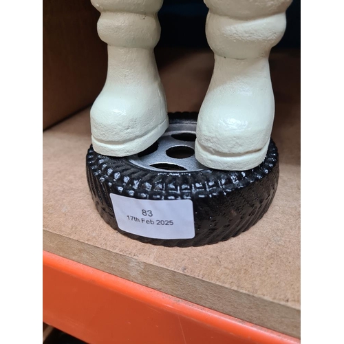 83 - Modern cast iron figure of Michelin man