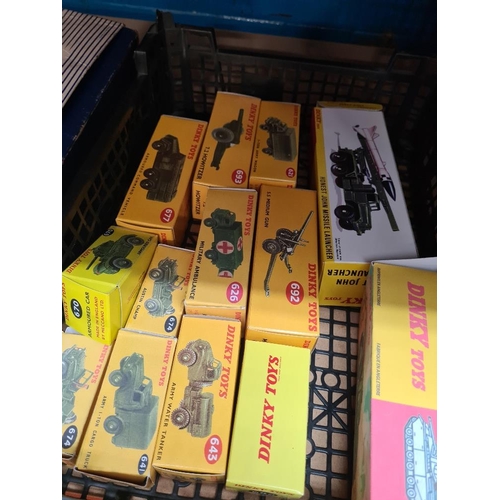 128 - Two trays of Dinky military vehicles mainly playworn, some original boxes, some reproduction