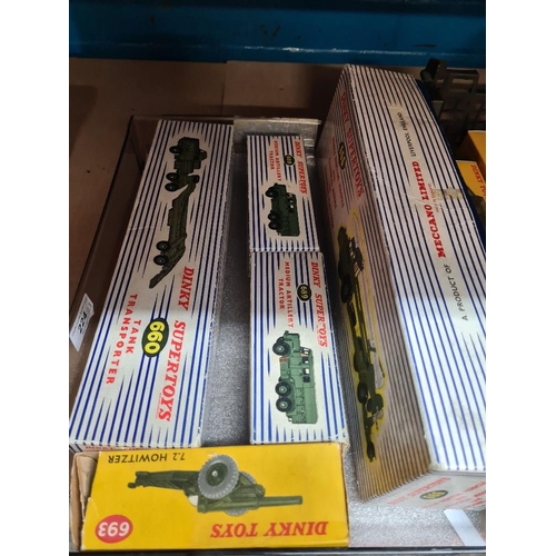 128 - Two trays of Dinky military vehicles mainly playworn, some original boxes, some reproduction