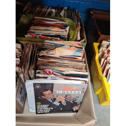 135 - Large quantity of vinyl 7 inch singles mixed genres