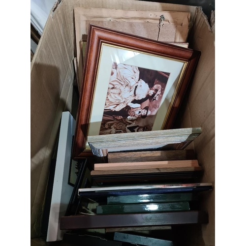 169 - Two boxes of assorted pictures and a few loose